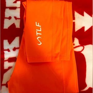 Orange TLF seamless scrunch butt leggings SIZE S